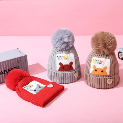 Gorro afelpado infantil con pompón variado