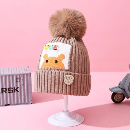 Gorro afelpado infantil con pompón variado