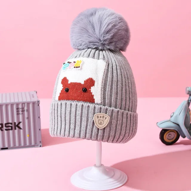 Gorro afelpado infantil con pompón variado